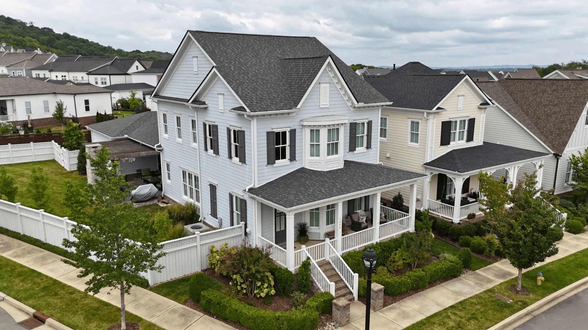 Roofer explaining findings to homeowner